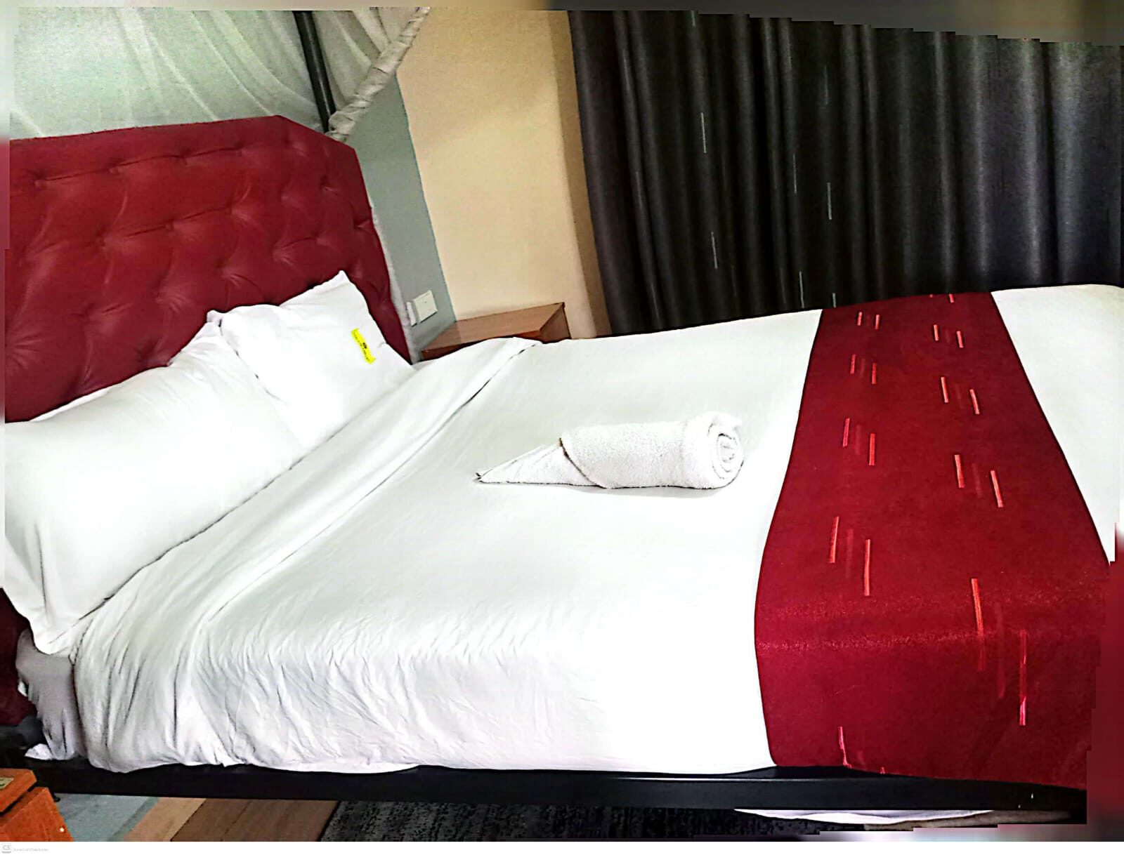Deluxe room with crisp white linens Toque Hotel Nairobi